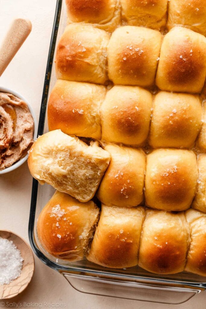 sweet potato rolls in glass baking pan.