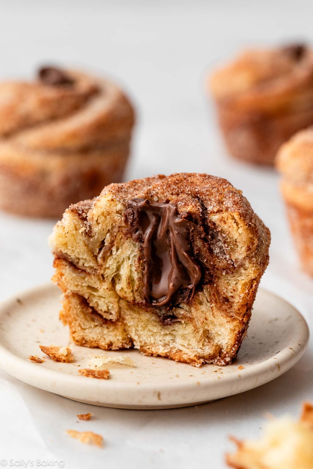 nutella stuffed cruffin on small plate.